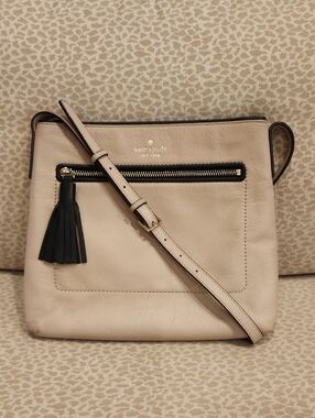 Kate Spade Chester Street Dessi Beige Leather Crossbody with Black Tassel Accent